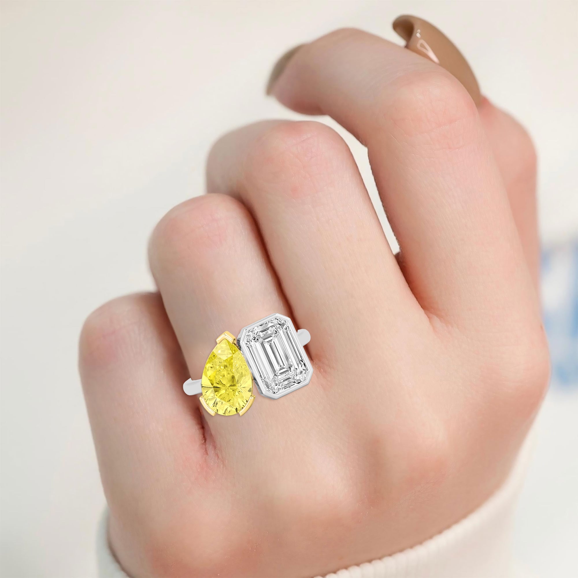 7.00ctw Emerald cut and Yellow Pear Lab Grown Diamond Toi et Moi Bezel Engagement Ring